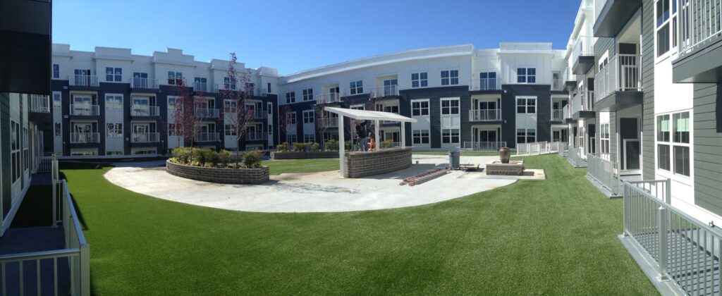 Synthetic turf after being professionally cleaned in an outdoor setting